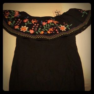 Black dress . Worn on or off shoulder